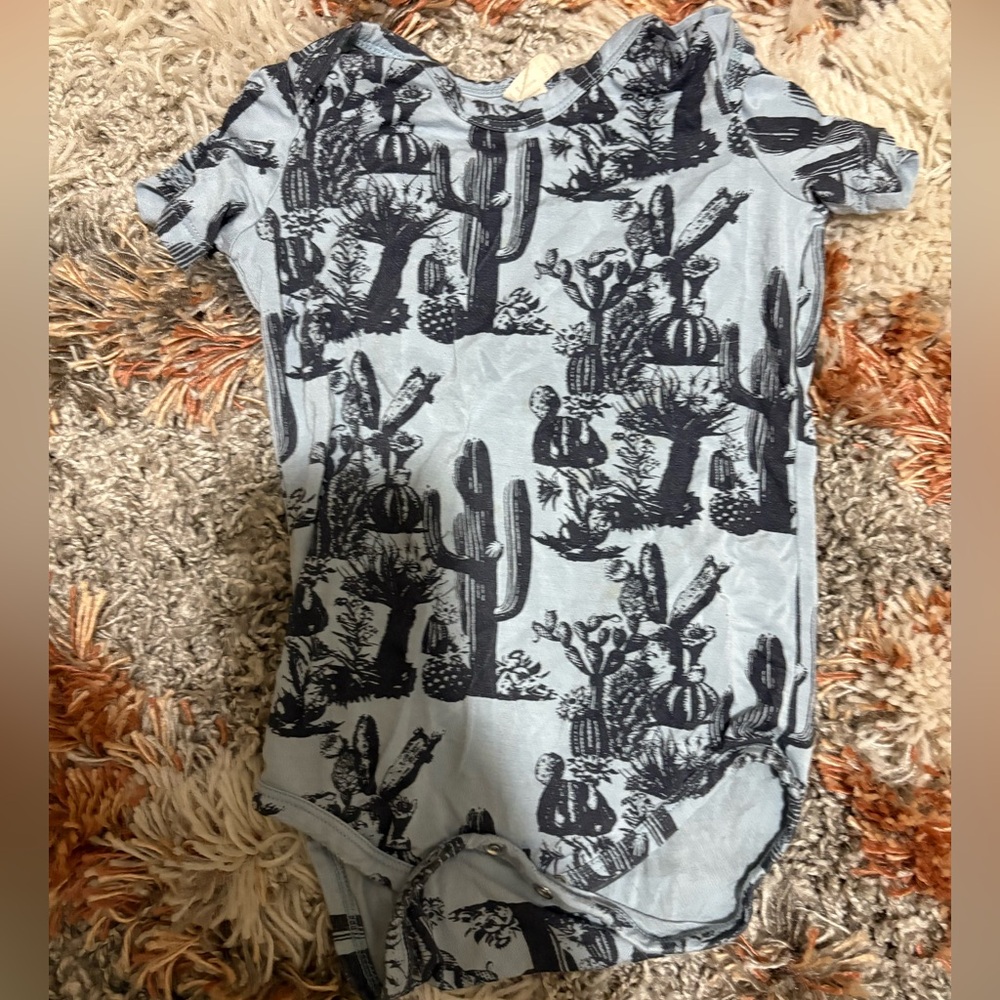 Kate Quinn body suit